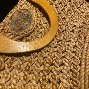 Vintage straw woven purse with wooden handles at least 58 years